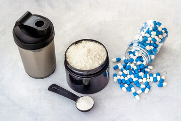Food sport supplement for training - whey protein in jar and sport pills