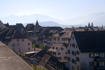 Aerial view of the old town of City of Rapperswil with Swiss Alps in the background on a sunny spring day. Photo taken April 28th, 2022, Rapperswil-Jona, Switzerland.