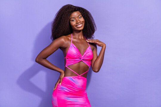 Photo Of Dreamy Adorable African Lady Dressed Pink Sexy Clothes Smiling Isolated Violet Color Background