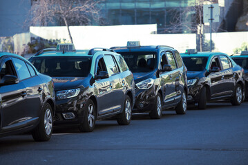 Taxi cars parked in a row in Lisbon