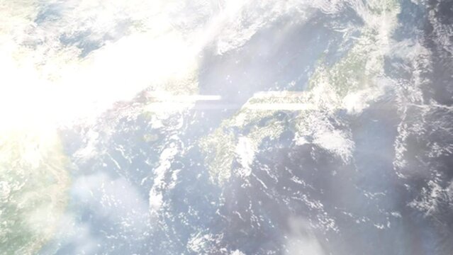 Earth zoom in from outer space to city. Zooming on Ube, Yamaguchi, Japan. The animation continues by zoom out through clouds and atmosphere into space. Images from NASA