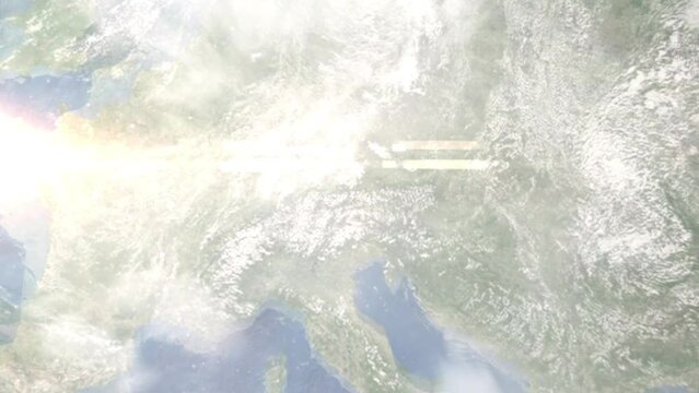 Earth zoom in from outer space to city. Zooming on Kufstein, Austria. The animation continues by zoom out through clouds and atmosphere into space. Images from NASA