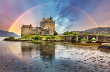 Sierkussen Eilean Donan Castle with rainbow and reflection in water, Scotland. © TTstudio
