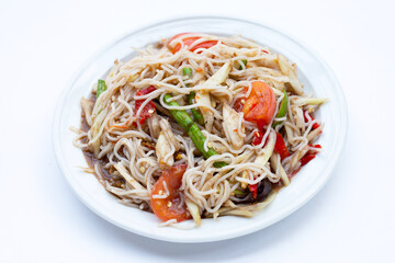 Spicy green papaya salad with vermicelli on white