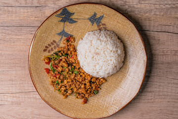 Minced pork basil with steamed rice, popular Thai food. Street food.