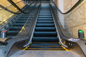Modern escalators in a shopping mall without people