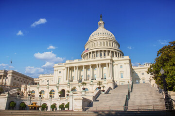 The United States Capitol building at Washington D.C. on a sunny day.