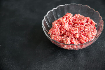 raw minced meat fresh beef, pork, lamb, chicken healthy meal food snack diet on the table copy space food background rustic top view