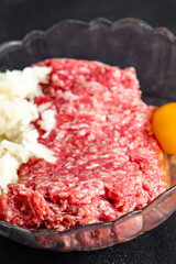 raw minced meat fresh beef, pork, lamb, chicken healthy meal food snack diet on the table copy space food background rustic top view