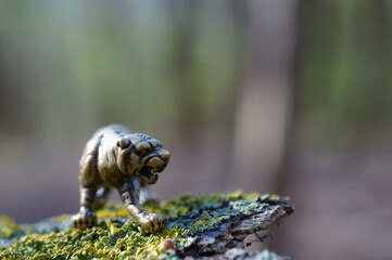 A metal tiger figurine. Talismans and amulets of feng shui.