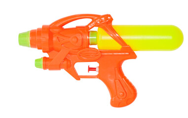 Plastic water gun on an isolated white background. Summer outdoor games by the pool or beach