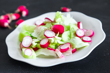 vegetable salad radish, cucumber, vegetable lettuce leaf fresh healthy meal food snack diet on the table copy space food background rustic top view veggie vegan or vegetarian