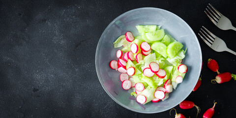vegetable salad radish, cucumber, vegetable lettuce leaf fresh healthy meal food snack diet on the table copy space food background rustic top view veggie vegan or vegetarian