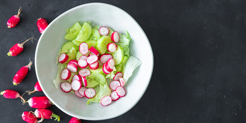 vegetable salad radish, cucumber, vegetable lettuce leaf fresh healthy meal food snack diet on the table copy space food background rustic top view veggie vegan or vegetarian