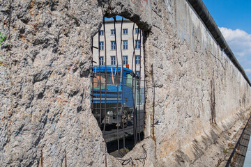 hole in berlin wall with truck