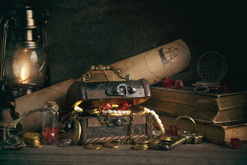 a chest with pirate treasures and jewels on a wooden table in the captain's cabin in retro style,...