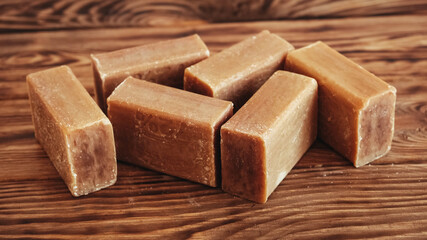 Laundry soap brown on a wooden background