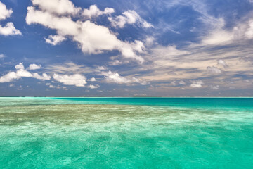 Maldives paradise scenery. Tropical aerial landscape, seascape with long jetty, water villas with amazing sea and lagoon beach, tropical nature. Exotic tourism destination banner, summer vacation