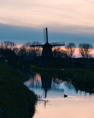 Windmill in the Netherlands at sunset