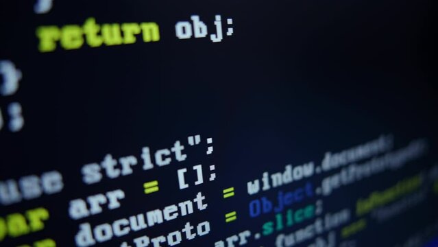 Close up of monitor screen with developing programming and coding technologies. Programmer or hacker is typing code on keyboard. Concept of bitcoin btc mining and development in virtual cyber space