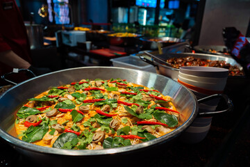 Spanish paella prepared in the street restaurant, close up