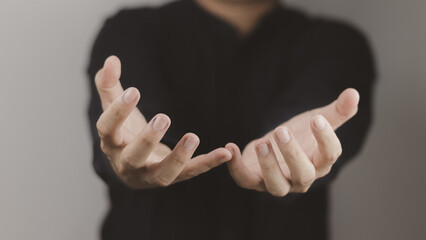 man's hand concept The man is spreading his hands at the level of his chest. Suitable for making products, products or symbols to put together with pictures.