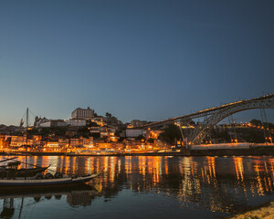 Cityscape of Porto over the Douro Luis II river in Porto, Portugal in Summer 2022.