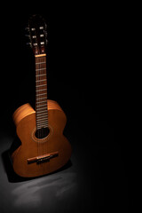 Obraz na płótnie Canvas Classical guitar on a plain background with copy space