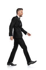 businessman walking on his way, minding his own business
