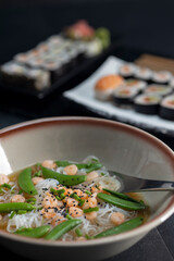 Various dishes of Asian cuisine with typical sushi