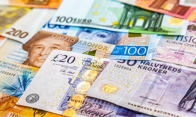 Background from banknotes of various currencies - 507821307