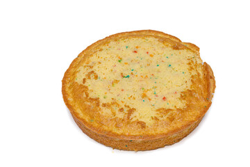Homemade confetti birthday cake from above isolated on white without icing.
