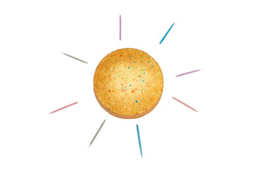 Confetti birthday cake from above with candles in a sun design isolated on white.