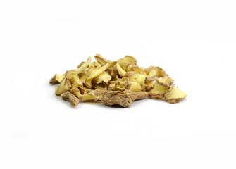 pile of dried ginger slices isolated on white background