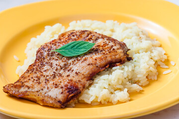 white fish on cumin served with rice