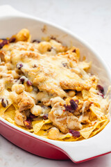 nachos with chicken meat, red beans and cheese