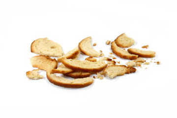 Bread crumbs, wholemeal bread isolated on a white background. leftover bread.