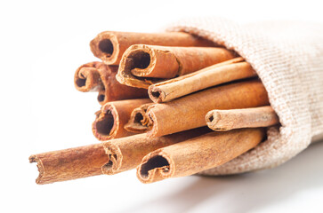 Group of cinnamon sticks on white background