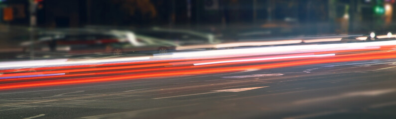 Fototapeta na wymiar Car lights in the night city. Traffic
