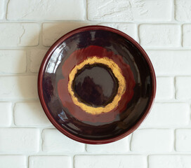 Mid-century modern pottery - red wall plate