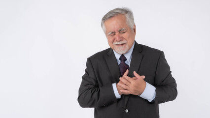 Asian senior businessman , old man with suit suffering from bad pain in his chest heart attack isolated on white background - senior heart disease