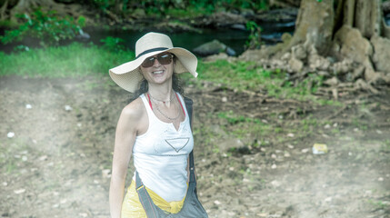 Female photographer on a forest excursion.