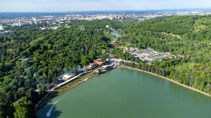 Top view from a drone of the lake and the park in summer