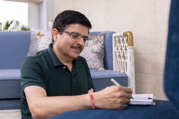 Mature man working from home