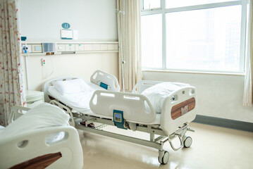 Empty bed in hospital ward - Powered by Adobe
