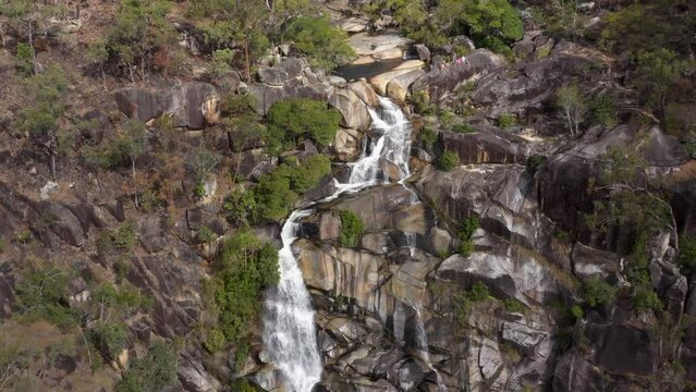 Davies Creek Falls waterfall backward aerial near Mareeba, Queensland, Australia