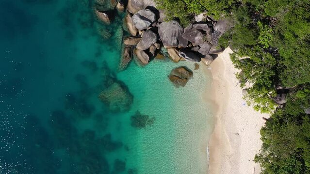 Beautiful Fitzroy Island top down aerial of Nudey Beach and clear turquoise water, Queensland, Australia