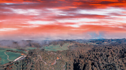 Huka Falls, New Zealand. Panoramic aerial view of beautiful waterfalls and countryside at sunset