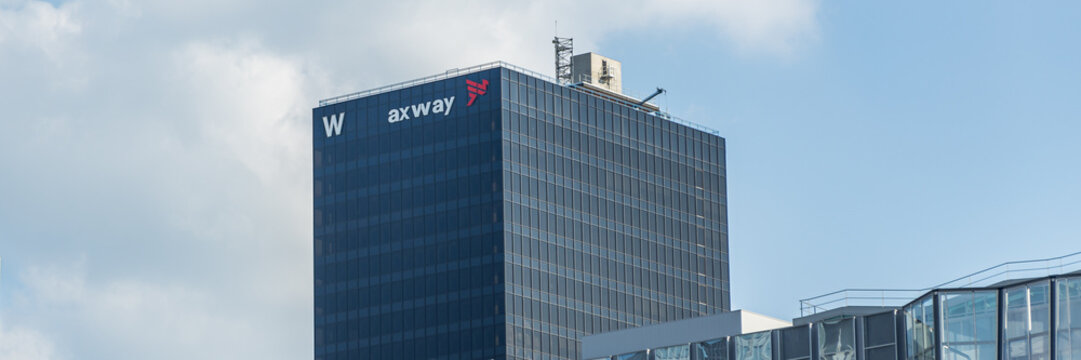 Tour W, a black tower housing the Axway headquarters in La Defense business district in Paris, France