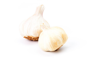 Two heads of garlic on a white background. Ecological food
